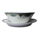 Old Lunéville sauce boat, opaque porcelain with polychrome decoration.