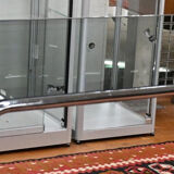 Vintage glass dining table with chrome legs.