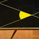 Brass and glass coffee table with compass feet