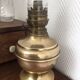 Old-fashioned brass standing oil lamp