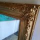 Very large gold mirror
