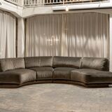 Large rounded velvet sofa