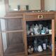 Art Deco wooden furniture with a swivelling mirror and marble top.