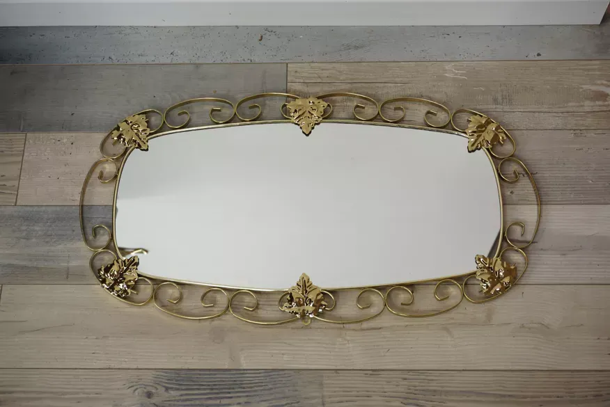 Miroir ovale années 50 en laiton - 38x69cm