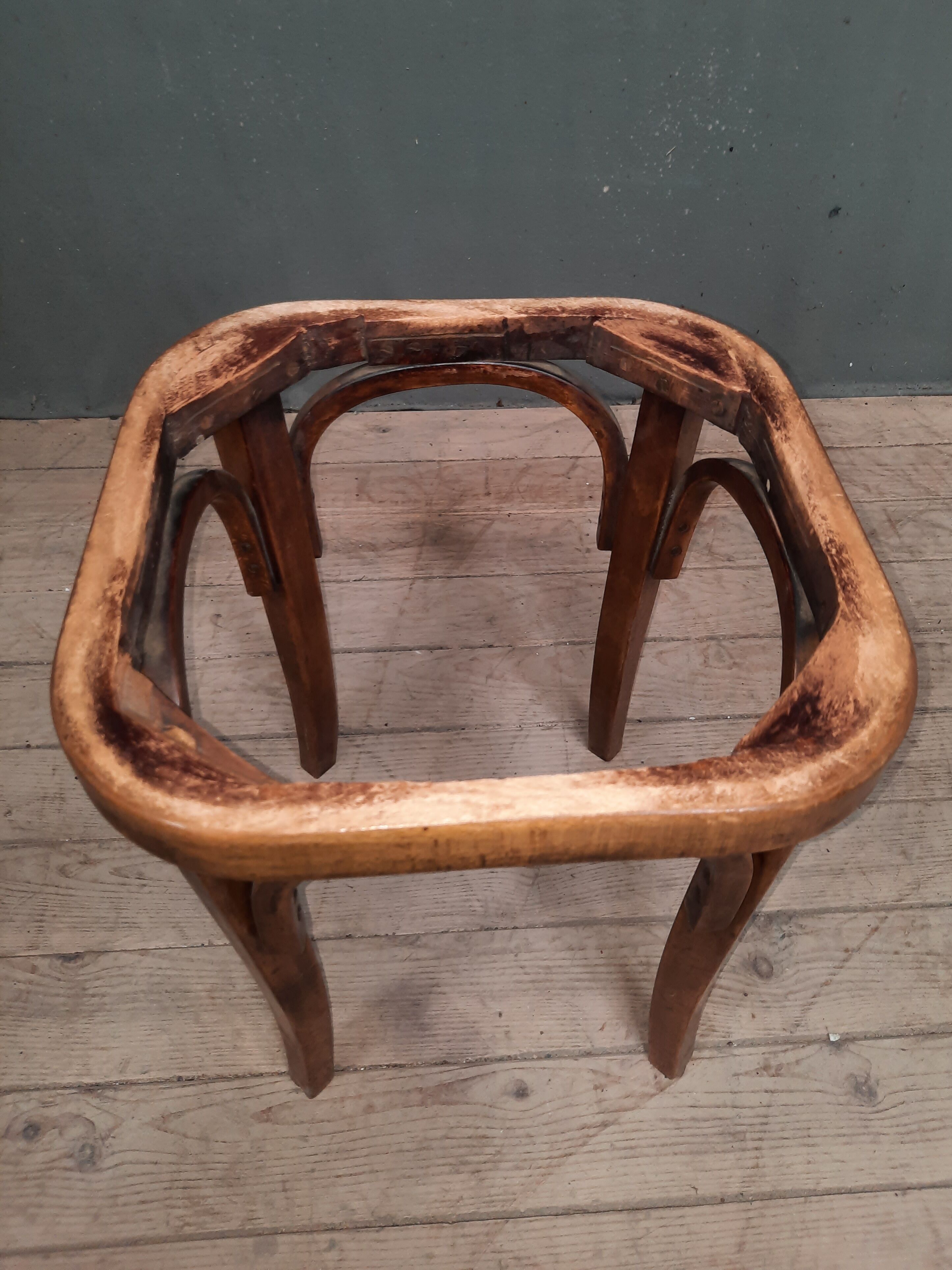 Curved wooden stool