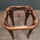 Curved wooden stool