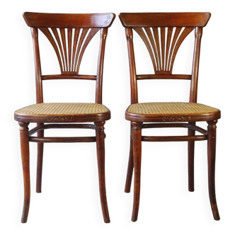 2 Thonet N°221 chairs, caned Art Nouveau bronze decor