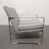Pair of designer armchairs
