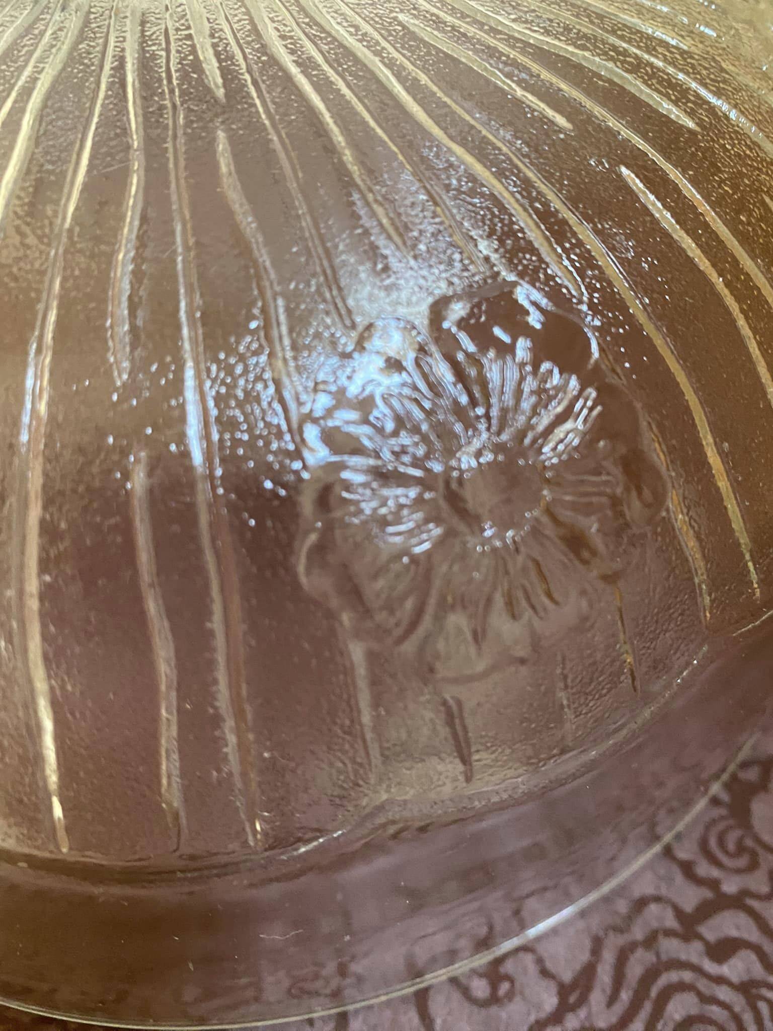 White glass bell. Floral patterns.