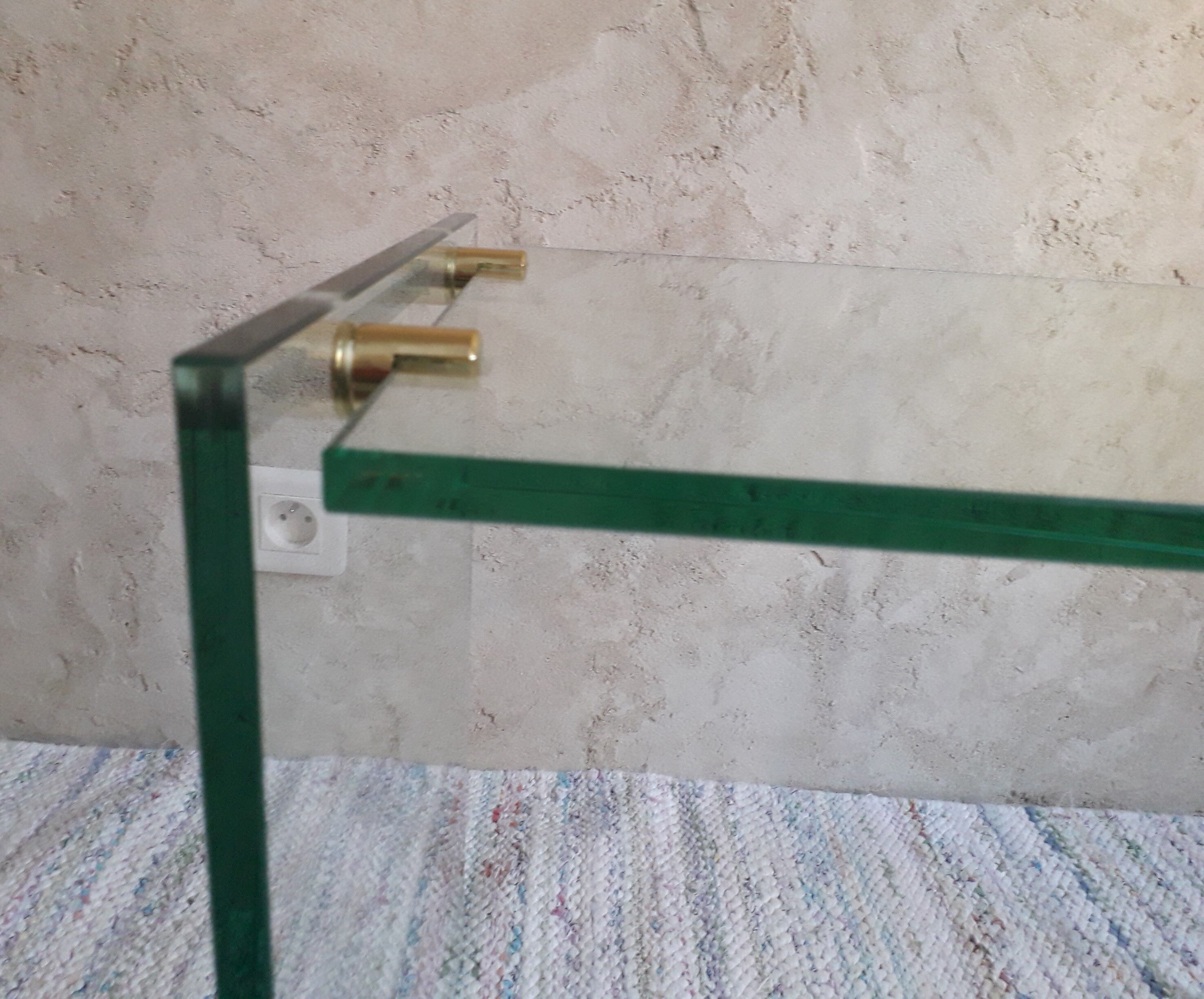 Glass and brass coffee table