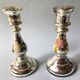 Paire de bougeoirs en verre argenté