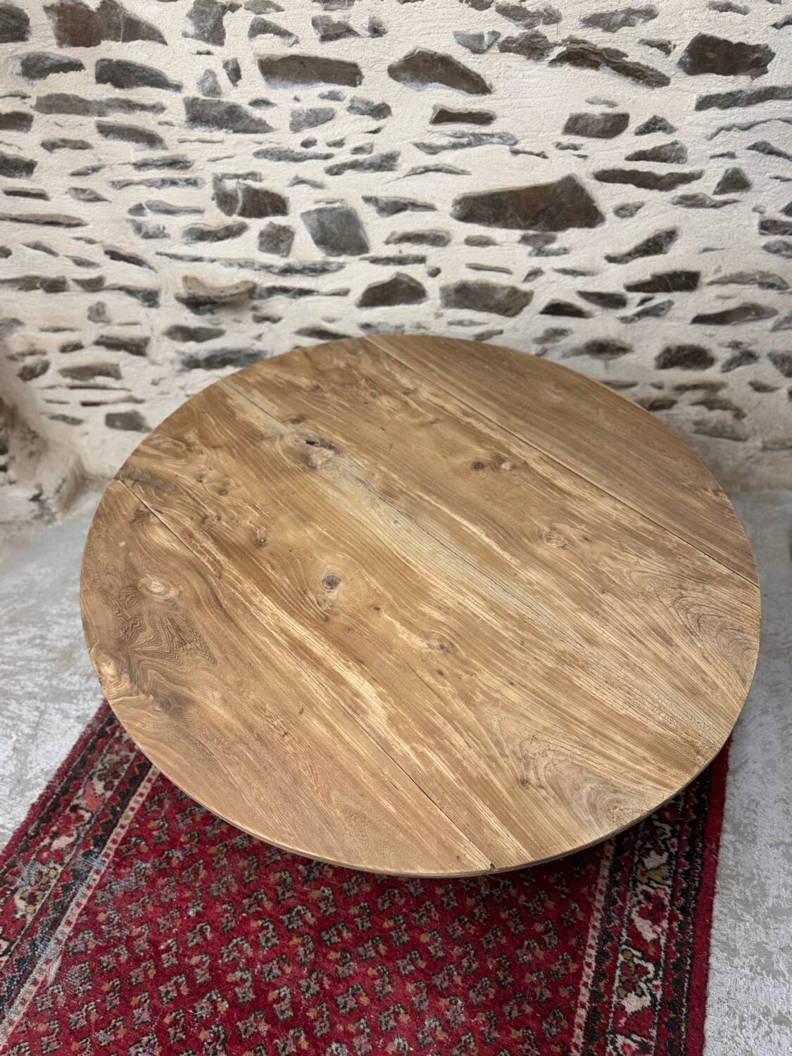 Oval coffee table in raw wood
