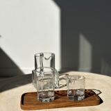 Trio of rounded rectangular trays or cups in monoxyl teak L:35