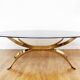 Italian coffee table in smoked glass and brass