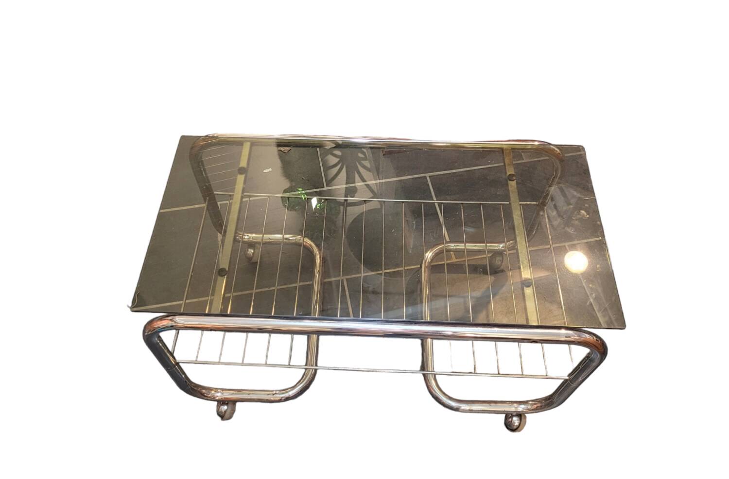 Coffee table with chrome base and smoked glass from the 70s