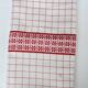 White and red embroidered tablecloth and eight matching napkins, 200x150cm