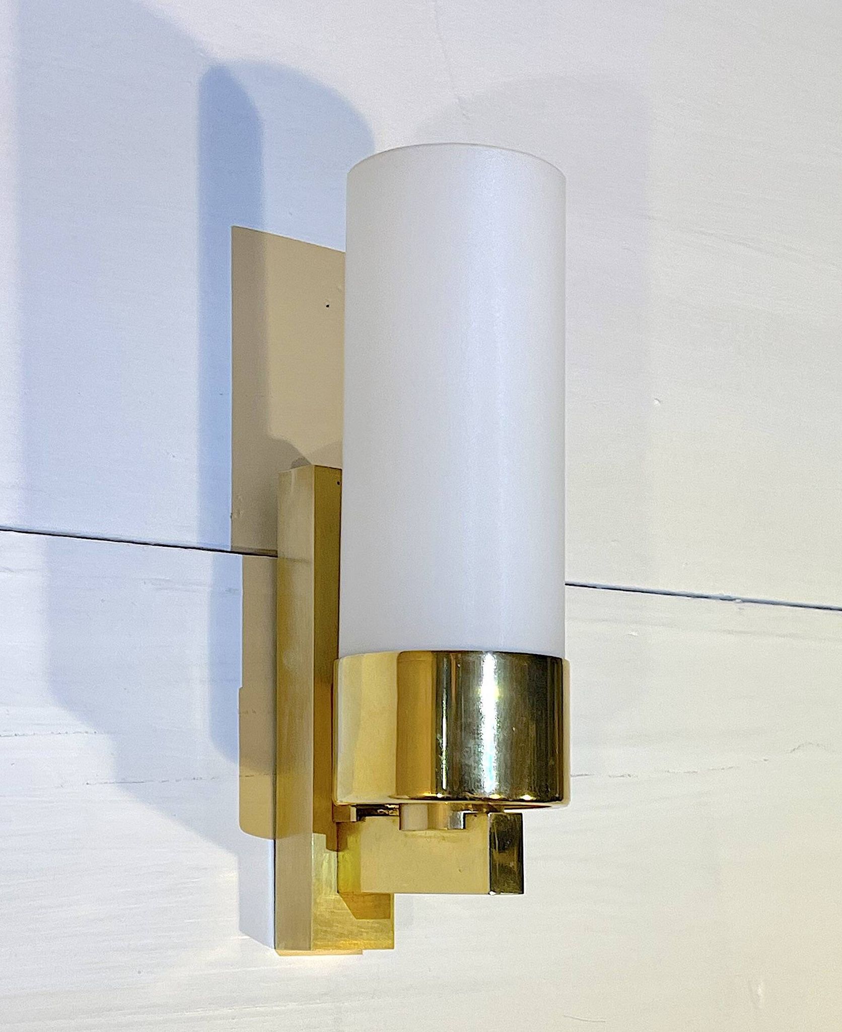 Set of three brass and opaline sconces, mid-century France