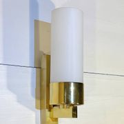 Set of three brass and opaline sconces, mid-century France