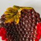 Slurry dish in the shape of a bunch of grapes