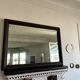 Beveled vintage mirror in painted wood 95x68cm
