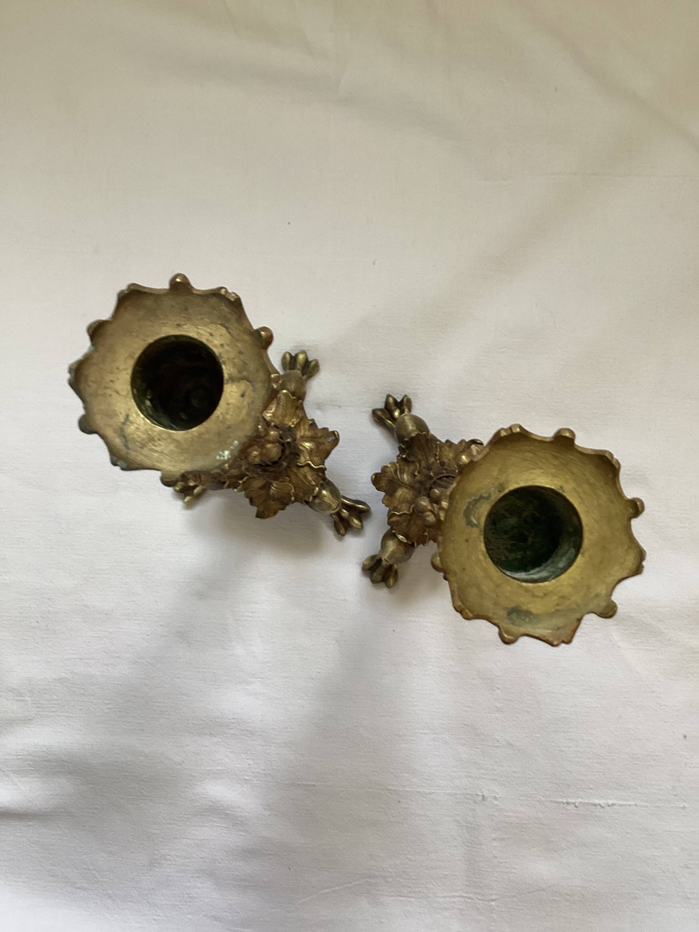 Old pair of bronze candlesticks