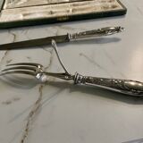 Leg cutlery set. Silver handles.