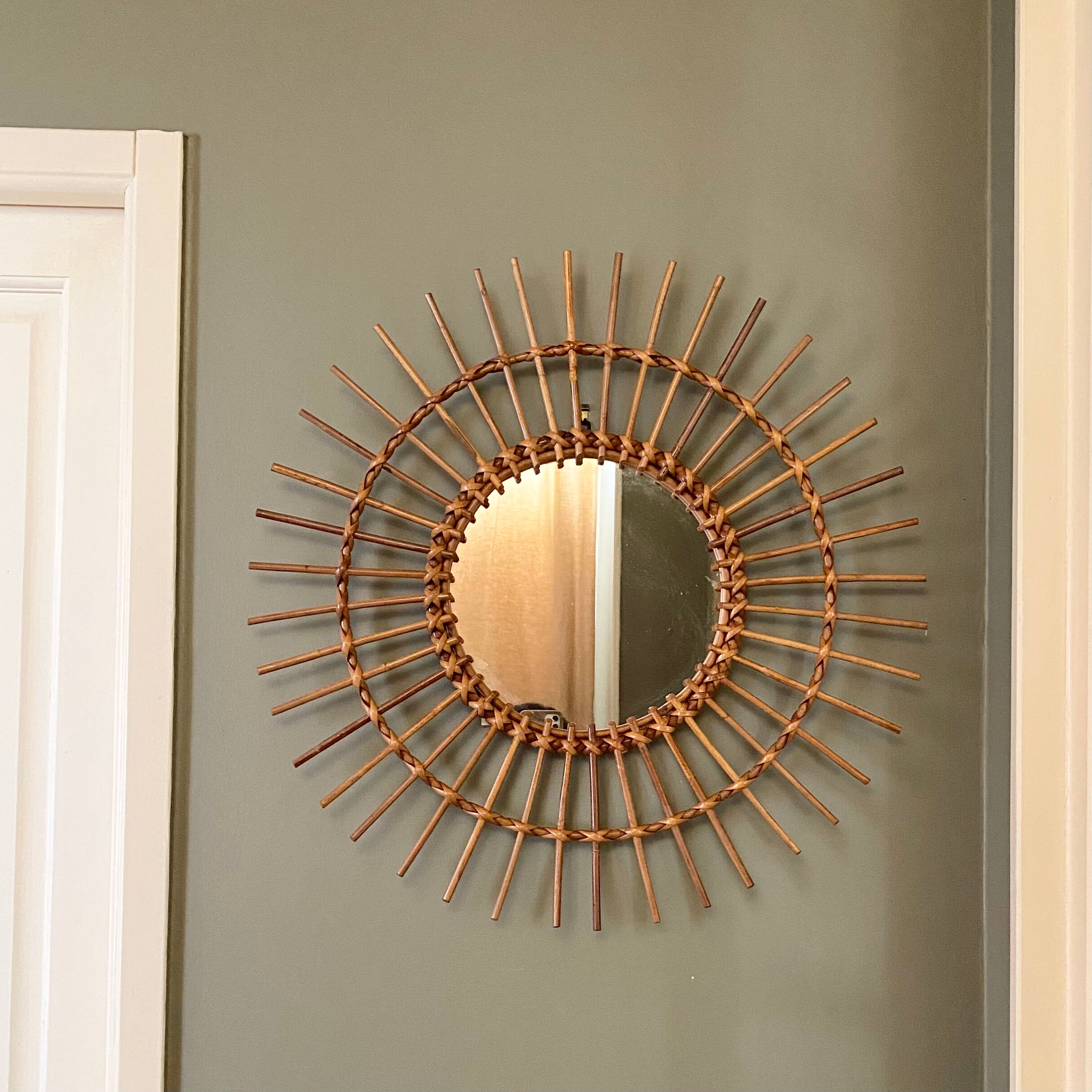 Vintage rattan sun mirror