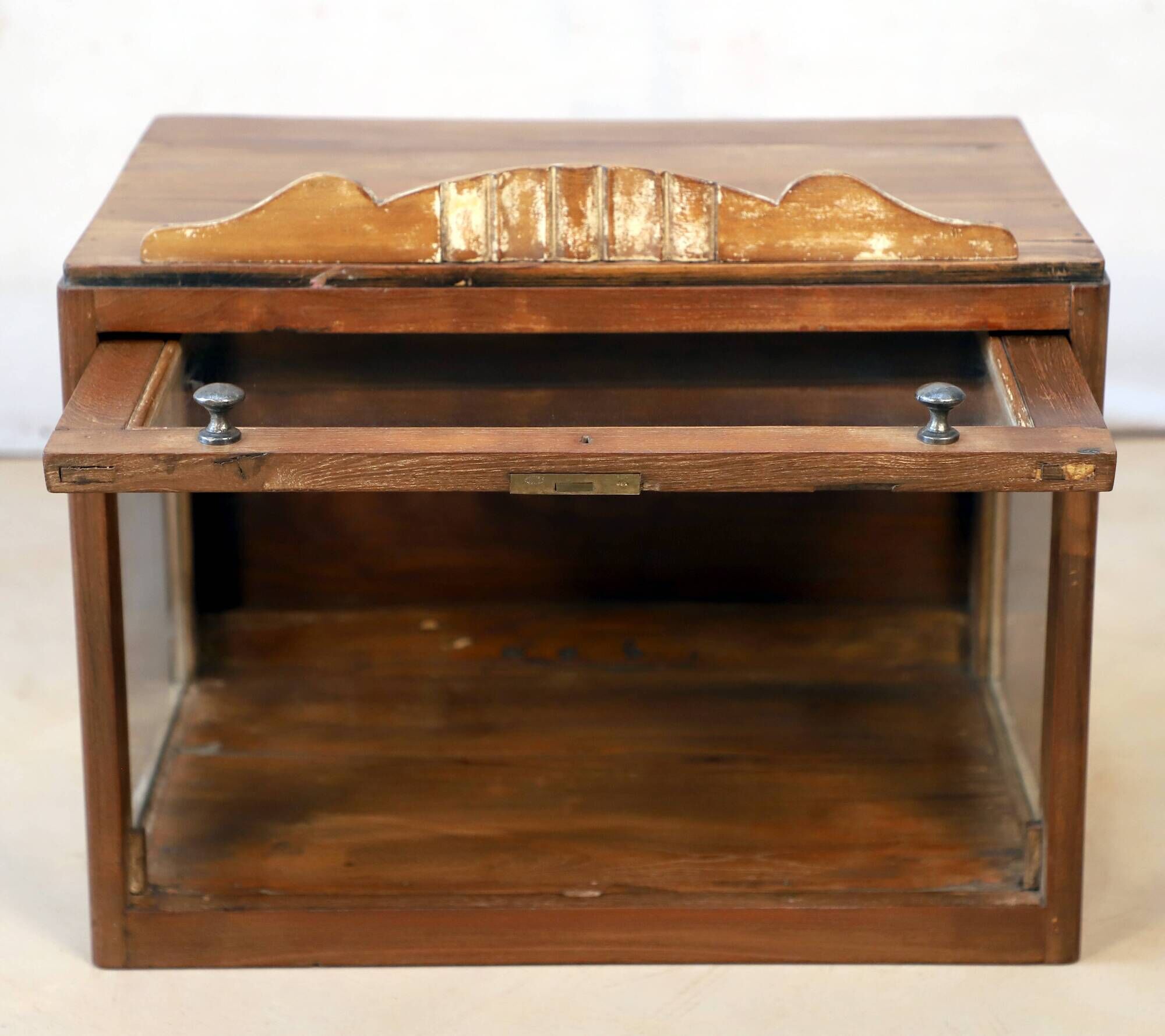 Art deco showcase in burmese teak