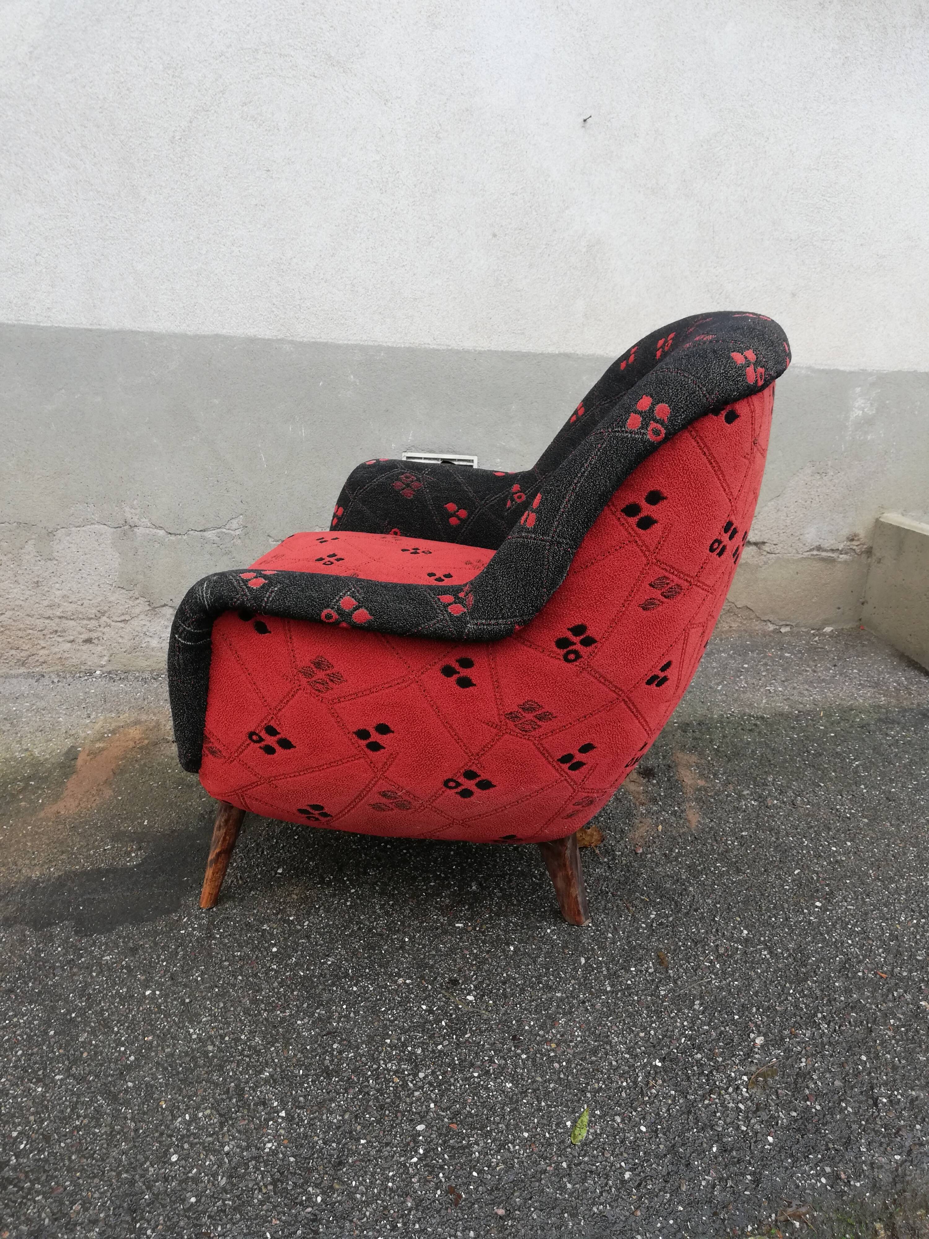 Fauteuil année 50 rouge et noir pieds compas