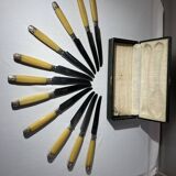 11 Art Deco knives, Bakelite and silver plated in a box