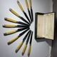 11 couteaux art déco, Bakélite et plaqué argent dans un coffret