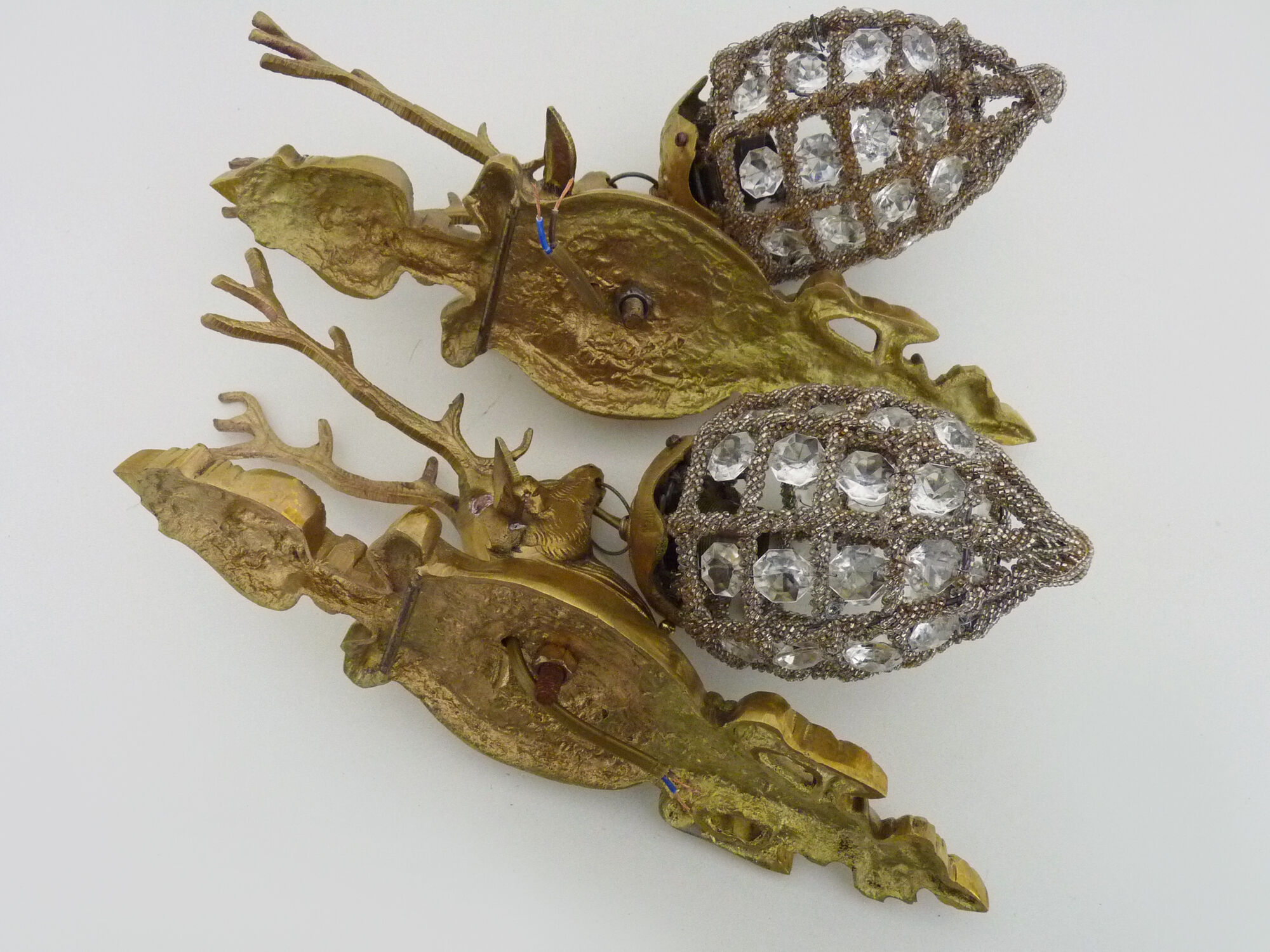 Pair of vintage wall lamps with pearl deer head and glass grapevines