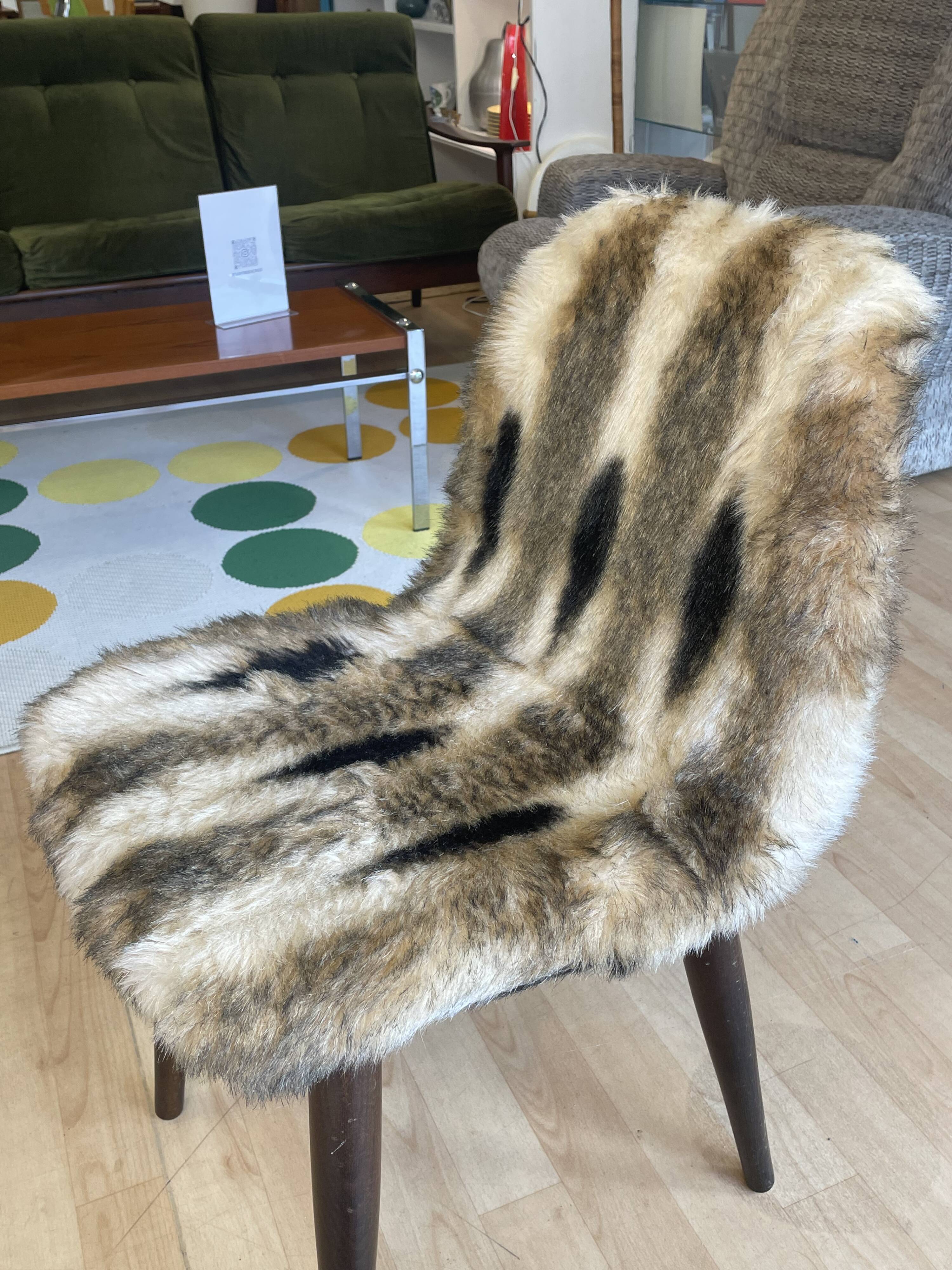 Faux fur chair with patterns & tapered dark wood legs