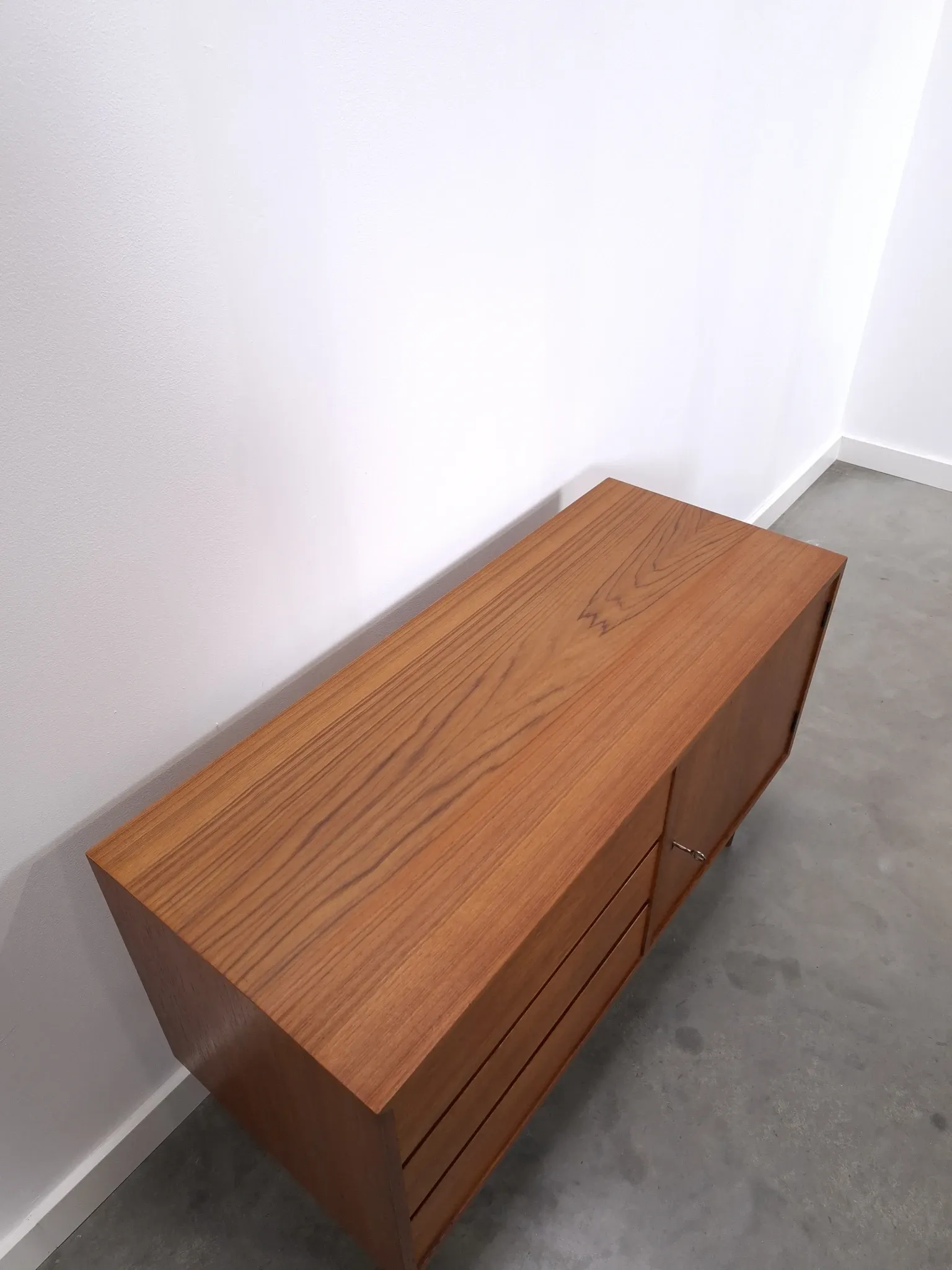 Vintage teak cabinet from the 1960s, sideboard with 3 drawers and a door.