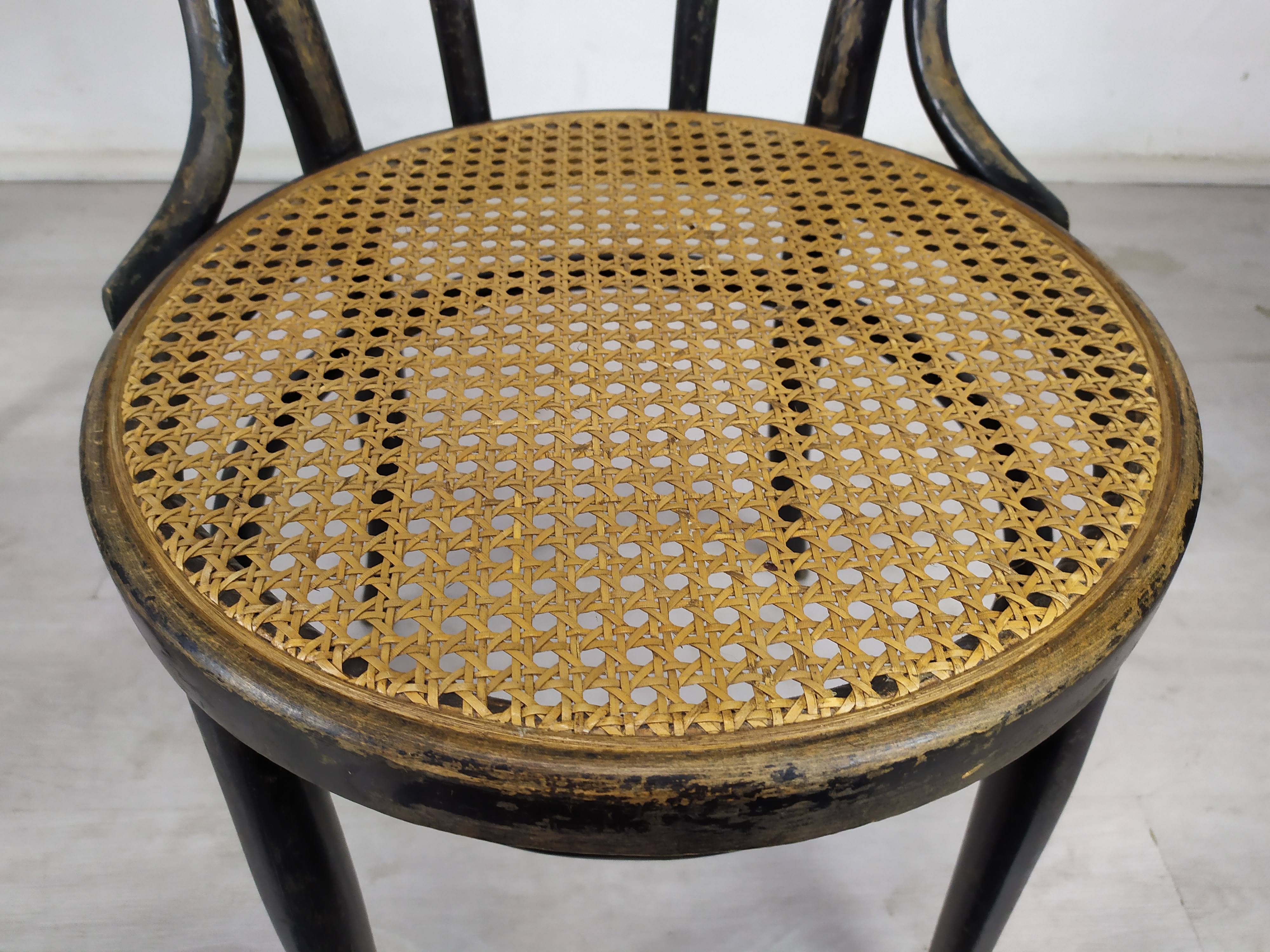 Black canned bistro chairs