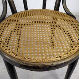 Black canned bistro chairs