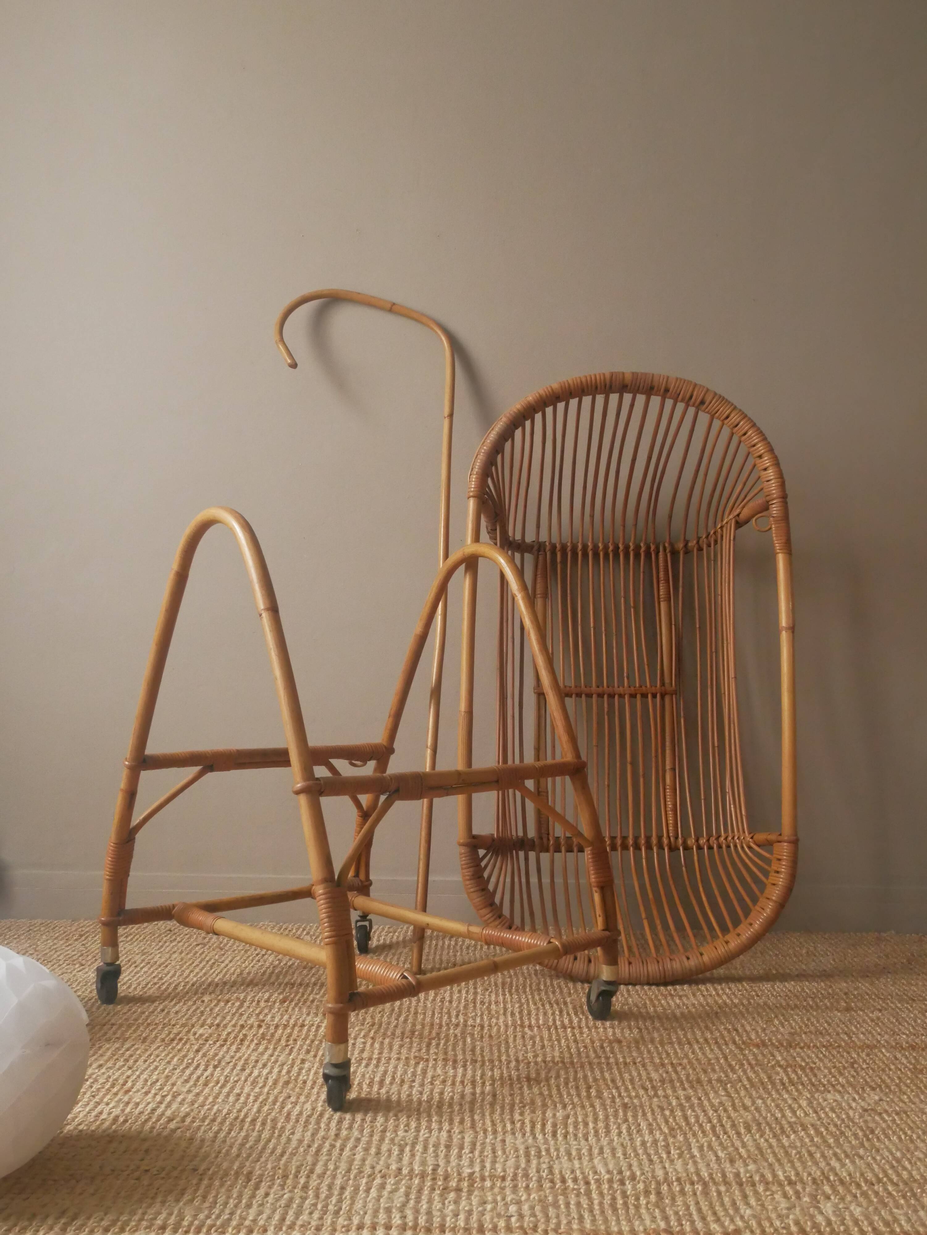 Vintage rattan cradle bassinet on wheels retro Scandinavian design baby bed