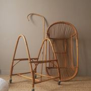 Vintage rattan cradle bassinet on wheels retro Scandinavian design baby bed