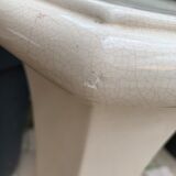 Column wears vintage plant