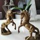 of greenhouse art deco bookends recancing unicorns. solid brass