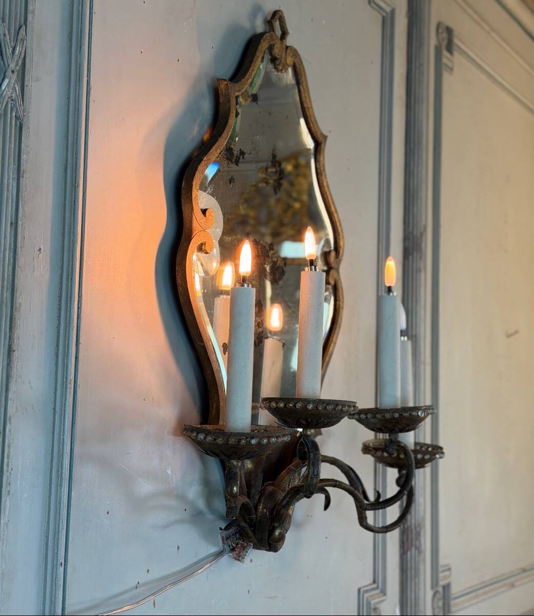 Gold metal wall mirror, in the style of Maison Baguès, Paris circa 1950.