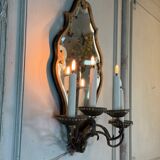 Gold metal wall mirror, in the style of Maison Baguès, Paris circa 1950.