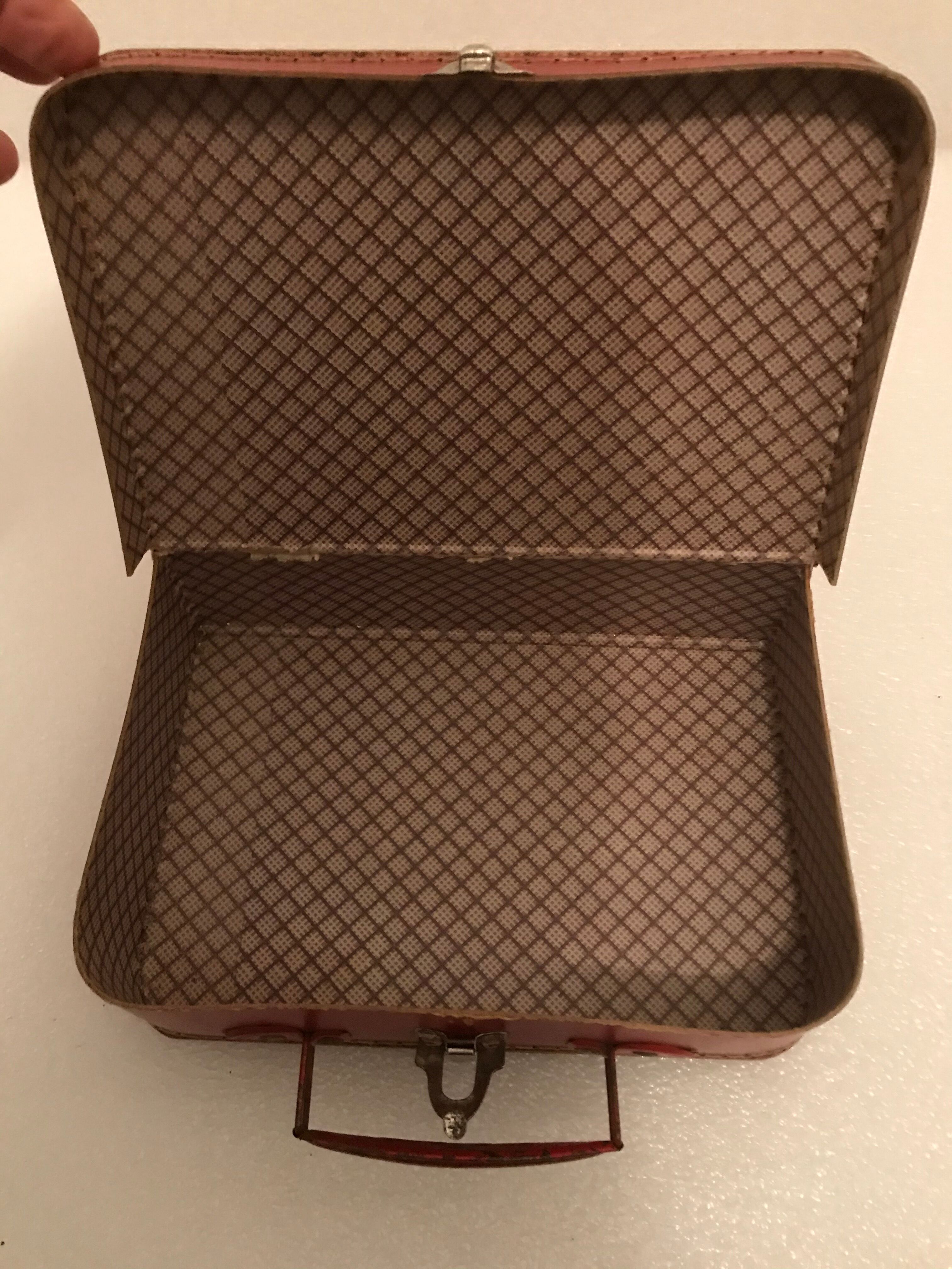 Vintage red card suitcase