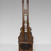 Wardrobe with Asian coat made of wood carved with dragons
