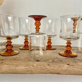 6 small amber-stemmed glasses