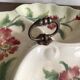 Art Nouveau slip dish with poppy decoration