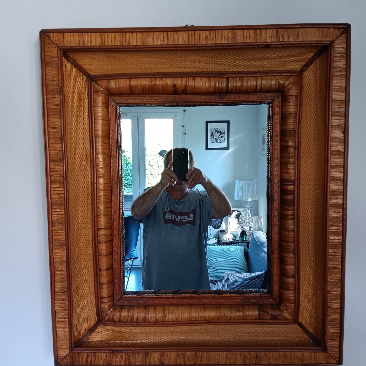 Wall mirror in rattan, wicker and wood