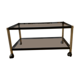 Glass coffee table on wheels