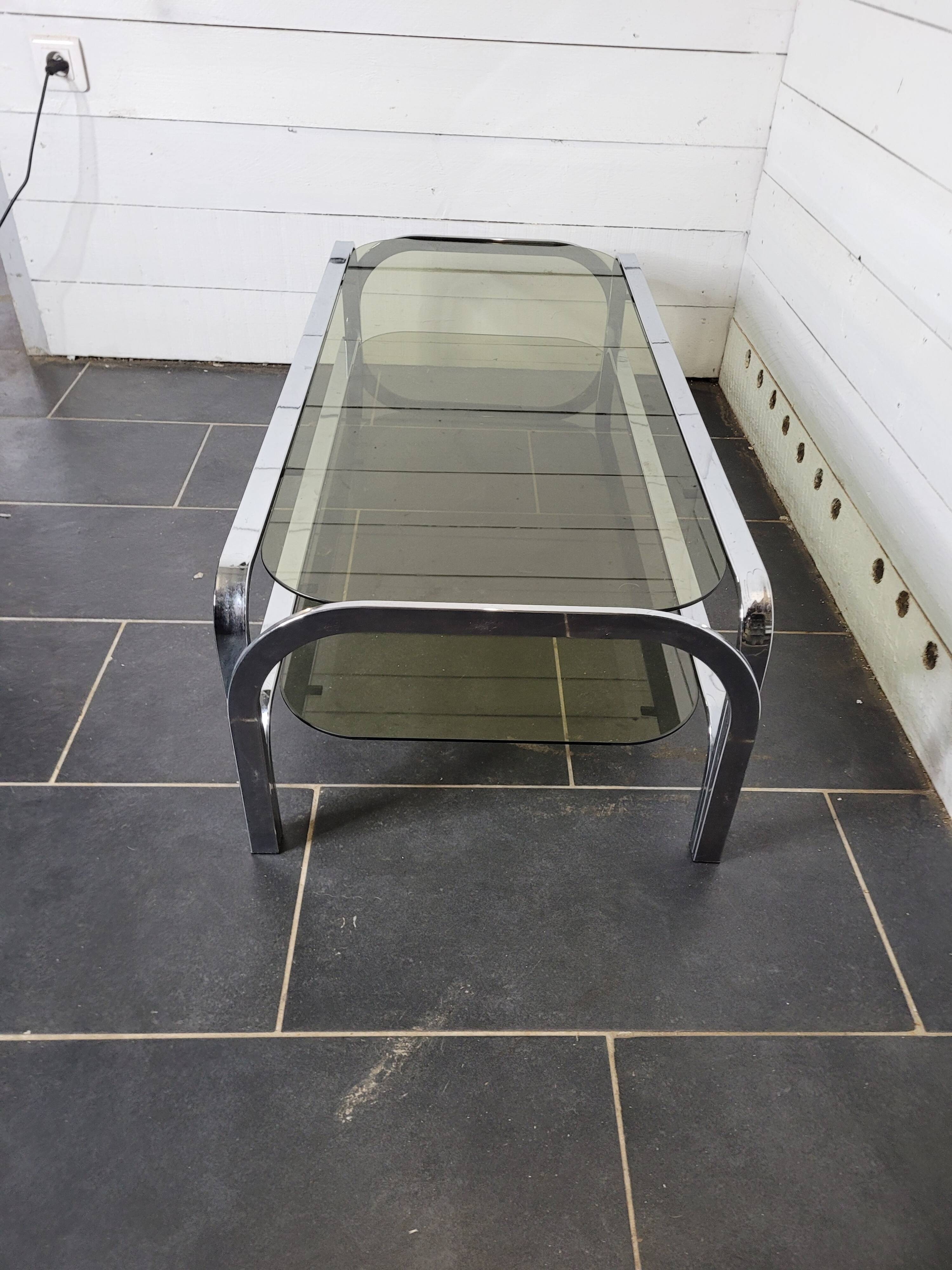 Chromed metal coffee table with smoked glass top from the 70s