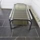 Chromed metal coffee table with smoked glass top from the 70s